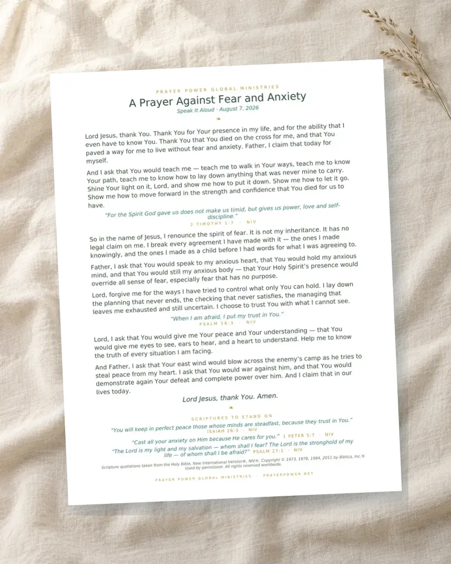 The printed prayer page resting on linen